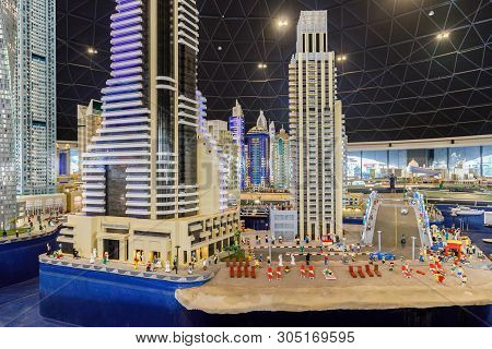Dubai, Uae, January 09, 2019: Miniatures Of High-rise Buildings Standing On  Coastline Of Sea  Close