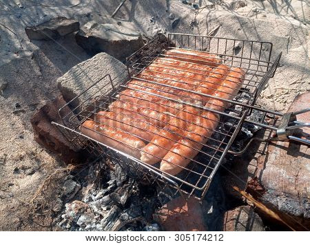 Kupaty Chicken Fried On A Fire. Barbecue From Kupaty.