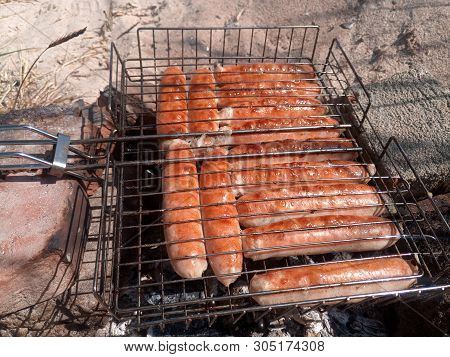 Kupaty Chicken Fried On A Fire. Barbecue From Kupaty.