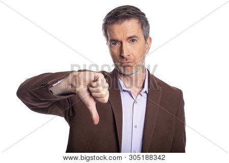 Middle Aged Bearded Businessman On A White Background Wearing A Brown Jacket.  The Mature Man Looks 