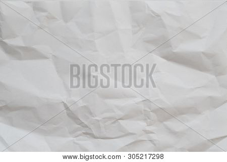 White Crumpled Paper Abstract Art Background. Wrinkled Texture Effect. Copy Space.