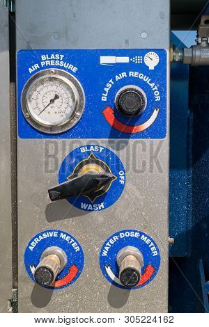 Close-up Detail Of Sandblaster Control Panel Knobs And Buttons
