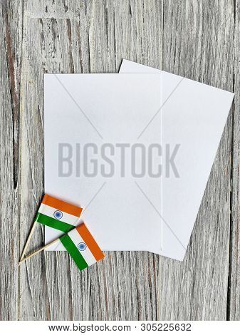 India Independence Day 15 August, Two Mini India Flags With Two Sheets Of White Paper, On White Rust