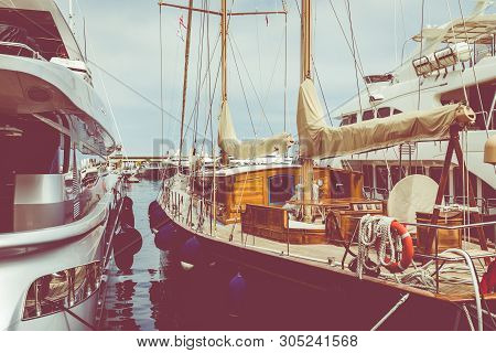 La Condamine, Monaco - June 04, 2019: Yachts Docked At Port Hercules In La Condamine Harbour. Citysc