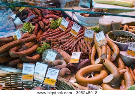 Munich, Germany - November 23, 2018 :counters And Showcases Of Butcher Shops At The Viktualienmarkt 