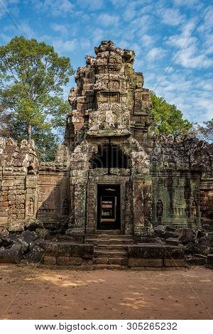 Ancient Ruins Of Ta Som Temple In Angkor Wat Complex Cambodia Stone Temple Ruin With Jungle Tree Aerial Roots Abandoned Temple Demolished By Tropical Jungle Poster Id