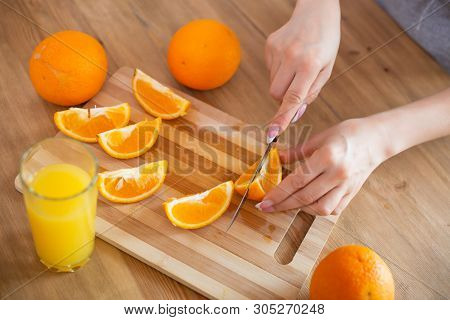 Cooking, Food And Concept Of Veganism, Vigor And Healthy Eating - Close Up Of Female Hand Cutting Or