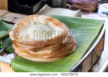 Penang Famous Apom Manis, Served On Banana Leaf.