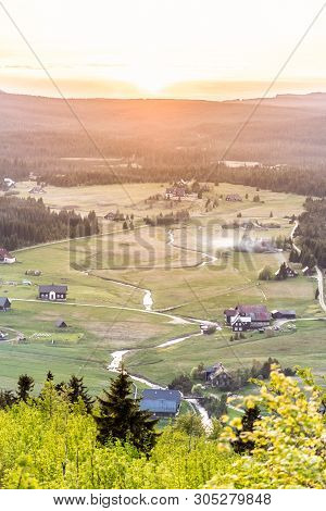 Jizerka Village At Sunset Time. View From Bukovec Mountain, Jizera Mountains, Czech Republic