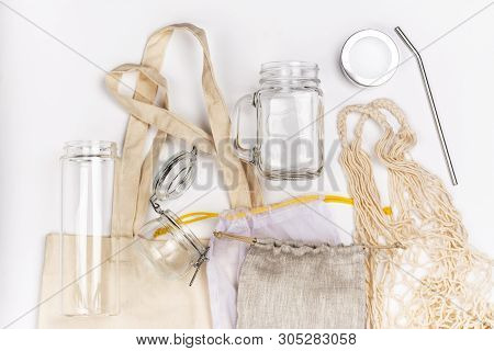Use Less Plastic Concept. Eco Freindly, Zero Waste Background. Fabric Bags, Glass Jars, Metal Straws
