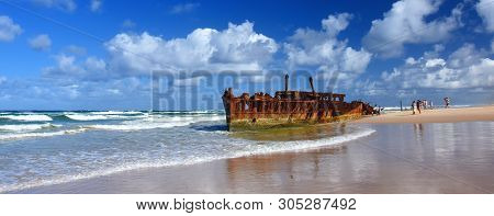 The Rusty Wreck Of The Vessel Maheno On The Shores Of Fraser Island (queensland, Australia). The Ant