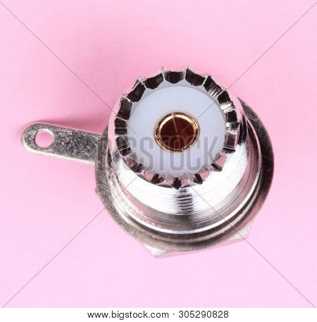 Radio Connector On Pink Background At Dry Sunny Summer Day