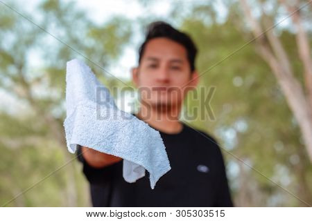 Man Give And Show Sweat On Hand Because Hot Weather  In The Parks
