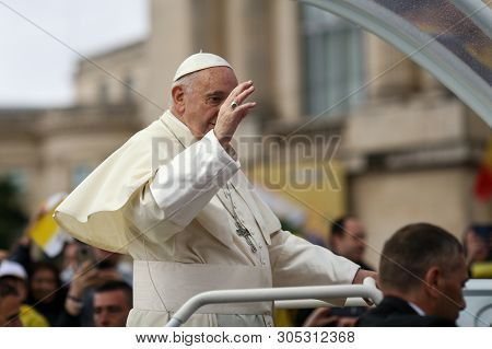Bucharest, Romania - May 31, 2019: Pope Francis Waves To The Crowd In His Popemobile Vehicle During 