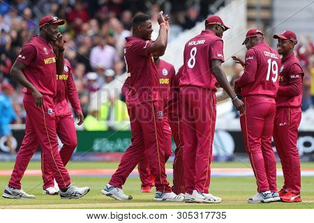 NOTTINGHAM, ENGLAND. 06 JUNE 2019: Sheldon Cottrell of West Indies takes a catch to dismiss Steve Smith of Australia during the Australia against West Indies, ICC Cricket World Cup match