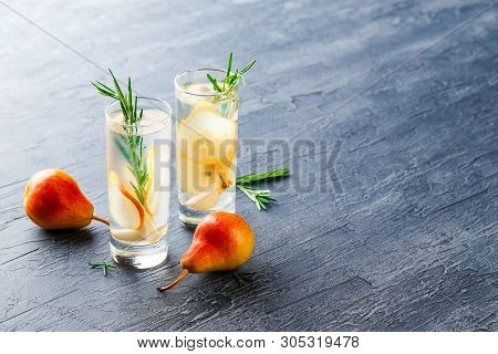 Summer Drinks, Rosemary Pear Cocktails With Ice N Glasses. Refreshing Summer Homemade Alcoholic Or N