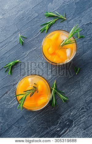 Summer Drinks, Rosemary Aprcot Cocktails With Ice In Glasses. Refreshing Summer Homemade Alcoholic O