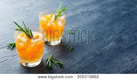Summer Drinks, Rosemary Aprcot Cocktails With Ice In Glasses. Refreshing Summer Homemade Alcoholic O