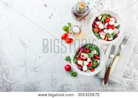 Salad From Iceberg Lettuce, Kale And Radiccio, Cherry Tomatoes, Radish, Mini Mozzarella And Pumpkin 