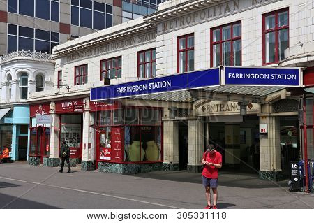 London, Uk - July 9, 2016: People Walk By Farringdon Station In London. London Underground Annual En