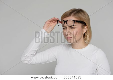 Woman Has Problems With Poor Eyesight, Squinting While Trying To See Something, Takingoff Glasses, I