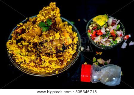 Popular Indian & Asian Kashmiri Dish I.e. Yakhni Or Akhni In A Glass Plate Along With Some Salad And