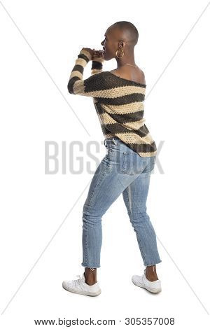 Black African American Female Model Holding A Hammer Repair Tool Looking Independent And Self Relian