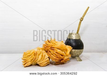 Fried Cakes And Yerba Mate Typical Of Argentine Gastronomy