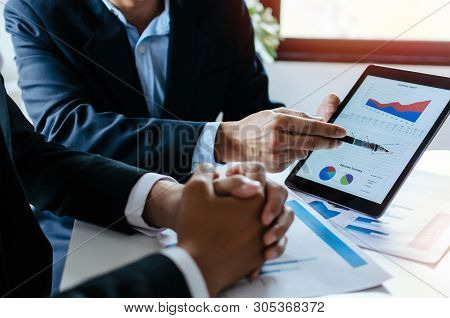 Partner Business Man Investor Team Brainstorming And Planning About Financial Statistics Chart Infor