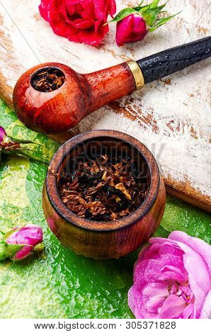 Smoking Pipe And Floral Tobacco