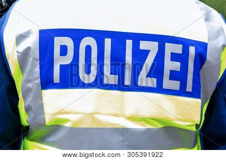 German Police Emblem Weared By An Officer. The German Word Polizei, Means Police.