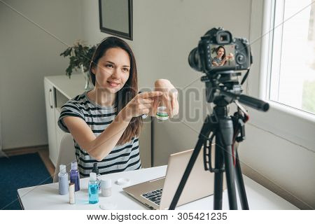 Girl Videoblogger Or Beauty Blogger Records Video For Subscribers How To Use The Cream And Talks Abo