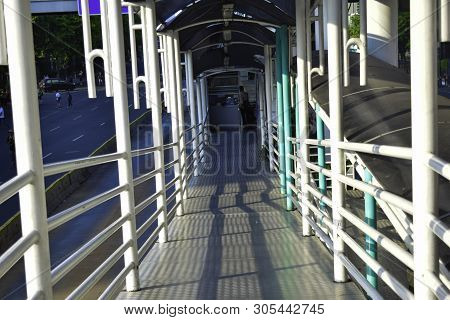 Jakarta, Indonesia, June 9 2019 : Modern Pedestrian Bridge Across The Road At M. H Thamrin Street In