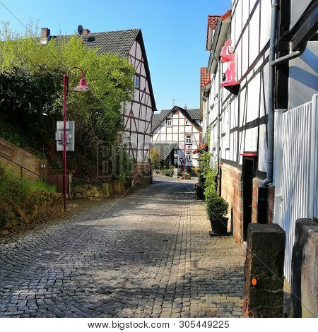 Beautiful View Of Historic Traditional Houses In Old Town In Europe With Blue Sky And Clouds In Summ
