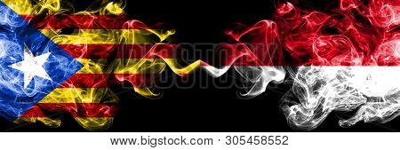 Catalonia Vs Monaco, Monacan Smoke Flags Placed Side By Side. Thick Colored Silky Smoke Flags Of Cat