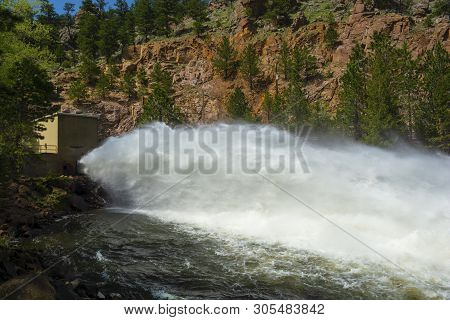 Water Shoots From The Button Rock Dam Floodgate In The Mountains West Of Longmont, Colorado
