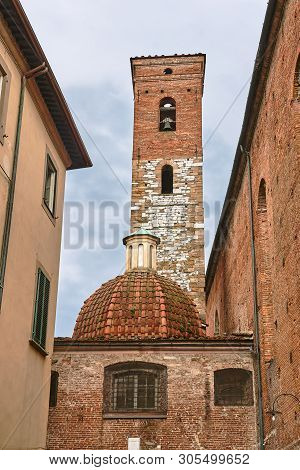 Stone, Medieval Church With A Bell Tower In The Village Of Lukka, Italy