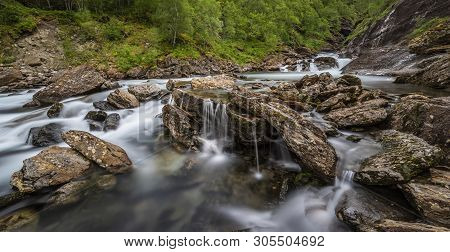 Long Exposure In An Waterfall. Taken At Klipforsen In Sørfold, Norway.
