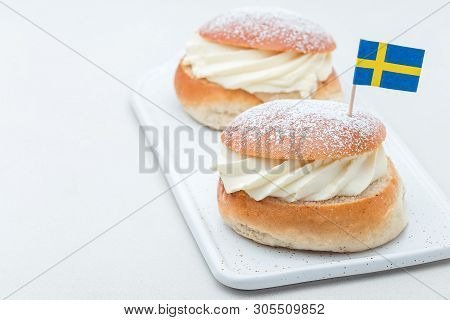 Traditional Swedish Dessert Semla, Also Called Shrove Bun, With Almond Paste And Whipped Cream Filli