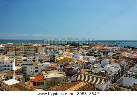 Aerial. The Southern City Of Portugal Faro View From The Top.
