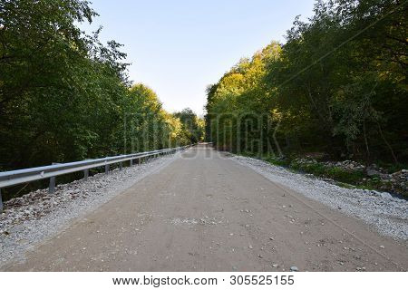 Panorama Mountain Road In A Wild Forest In Cherek Gorge In The Mountains Of The North Caucasus