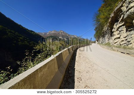 Mountain Road Through The Gorge With Railings And Rocks In The Cherek Gorge In The Mountains Of The 