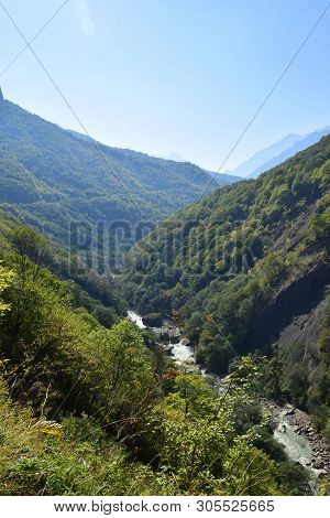 View Of A Mountain River In A Gorge With Stones And Mountains With A Forest In Cherek Gorge In The M