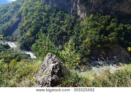 Panorama Of The Deep Mountain Cherek Gorge With Wild Forest On The Rocks In The Mountains Of The Nor
