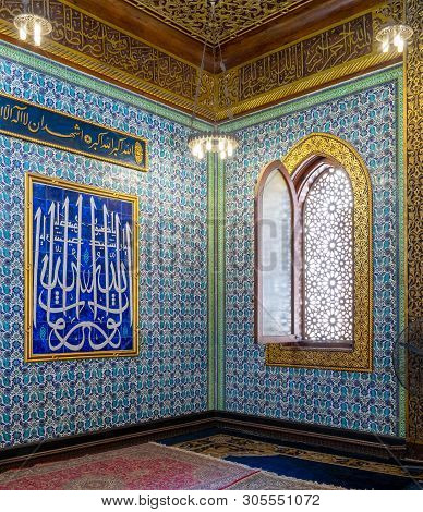 Cairo, Egypt- October 21 2017: Turkish Blue Floral Pattern Ceramic Tiles Wall With Wooden Arched Dec