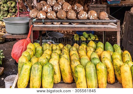 Makassar, Sulawesi, Indonesia - February 28, 2019:  Terong Street Market. Closeup Of Papaya And Coco
