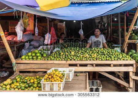 Makassar, Sulawesi, Indonesia - February 28, 2019: Terong Street Market. Citrus Fruit Booth Offers H