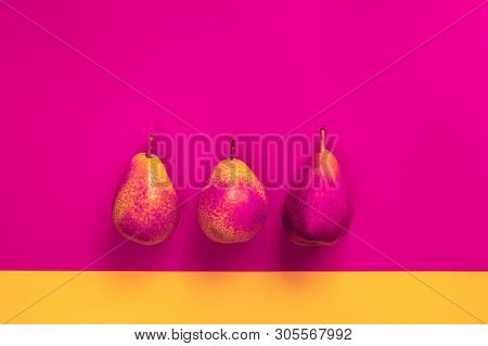 Yellow-pink Pears On A Colored Background. Vitamins, Organic Products, Autumn Harvest, Vegetarianism