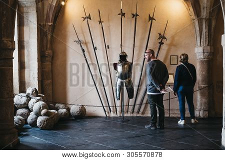 Vianden, Luxembourg - May 18, 2019: People Looking At Exhibits In Vianden Castle, Luxembourg, One Of