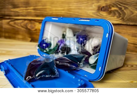 Capsules With Gel For Washing In A Plastic Container